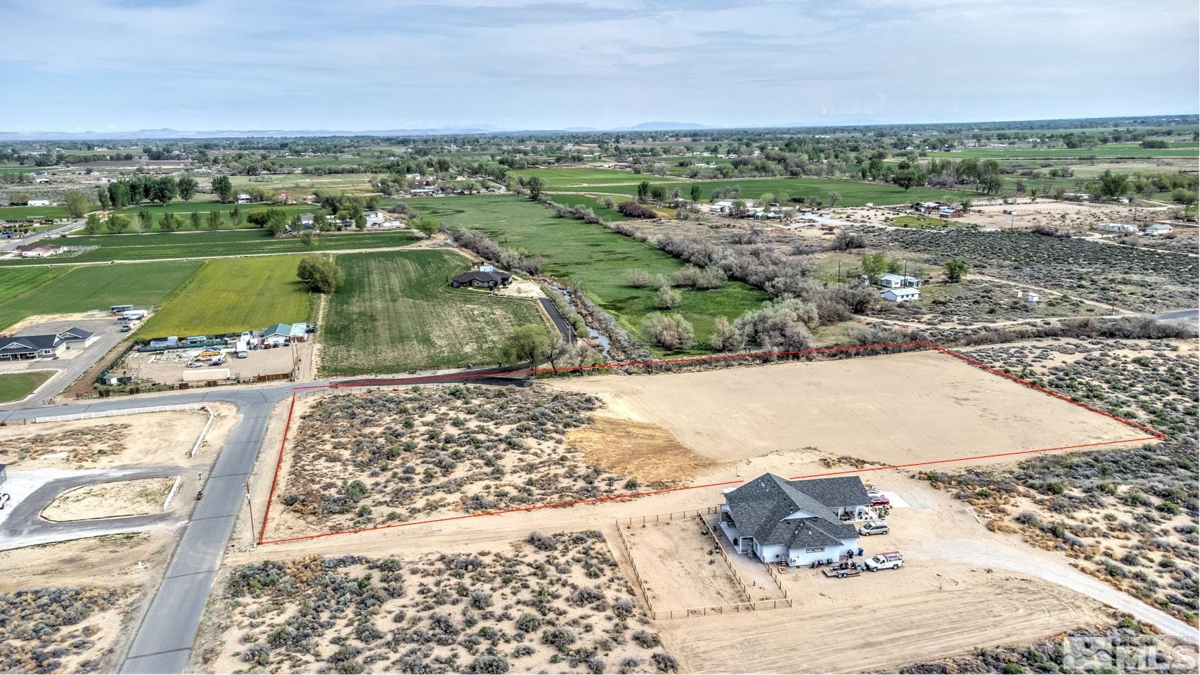 4047 Horseshoe Drive Fallon, NV 89406 - Photo 3 of 5 an aerial view of a house with a lake view