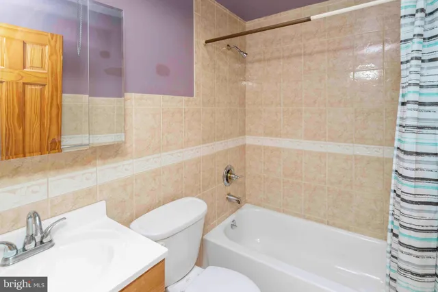 a bathroom with a sink and a bathtub