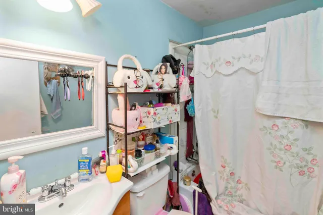 a view of storage and utility room with toys