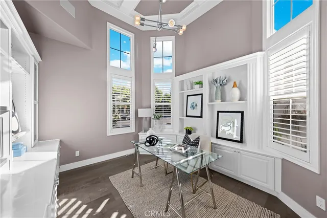a living room with patio furniture and a window