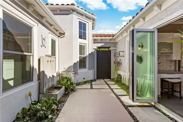 a view of a backyard with garden