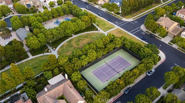 a view of a storage and utility room with washer and dryer