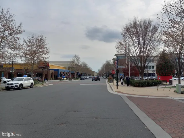 a view of street with parked cars