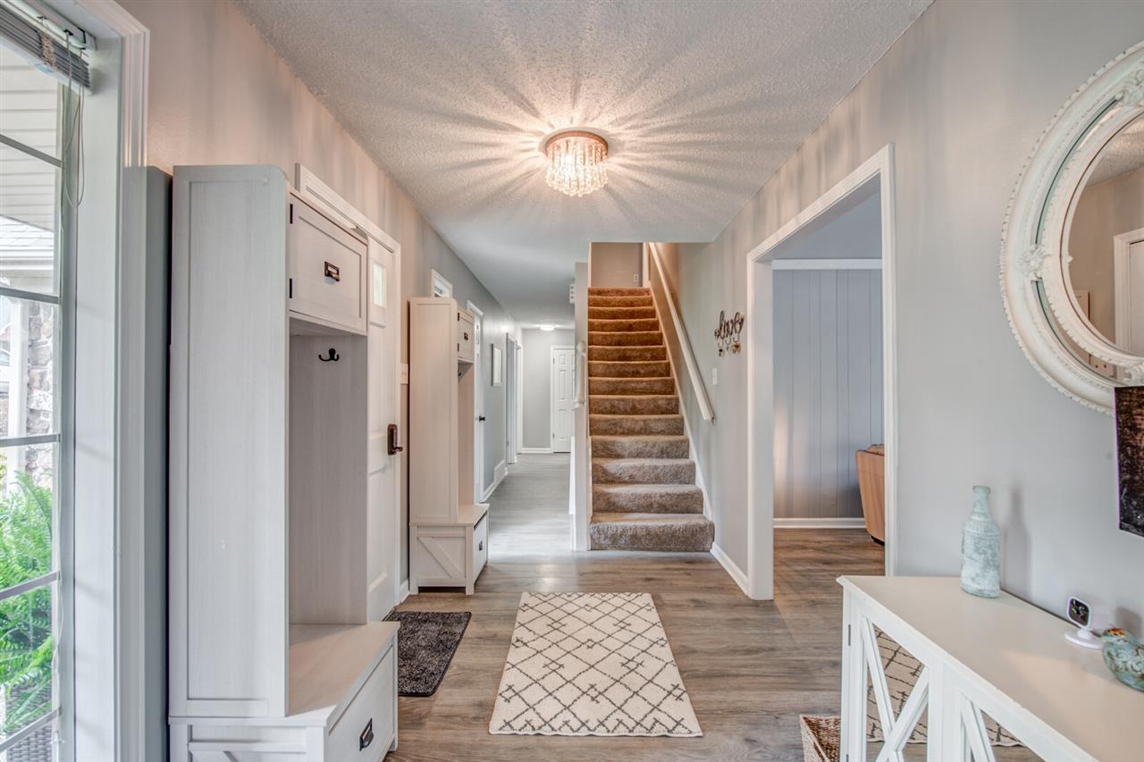 3156 Canyon Road Memphis, TN 38134 - Photo 4 of 25 Stairway leads up to two bedrooms and full bath.