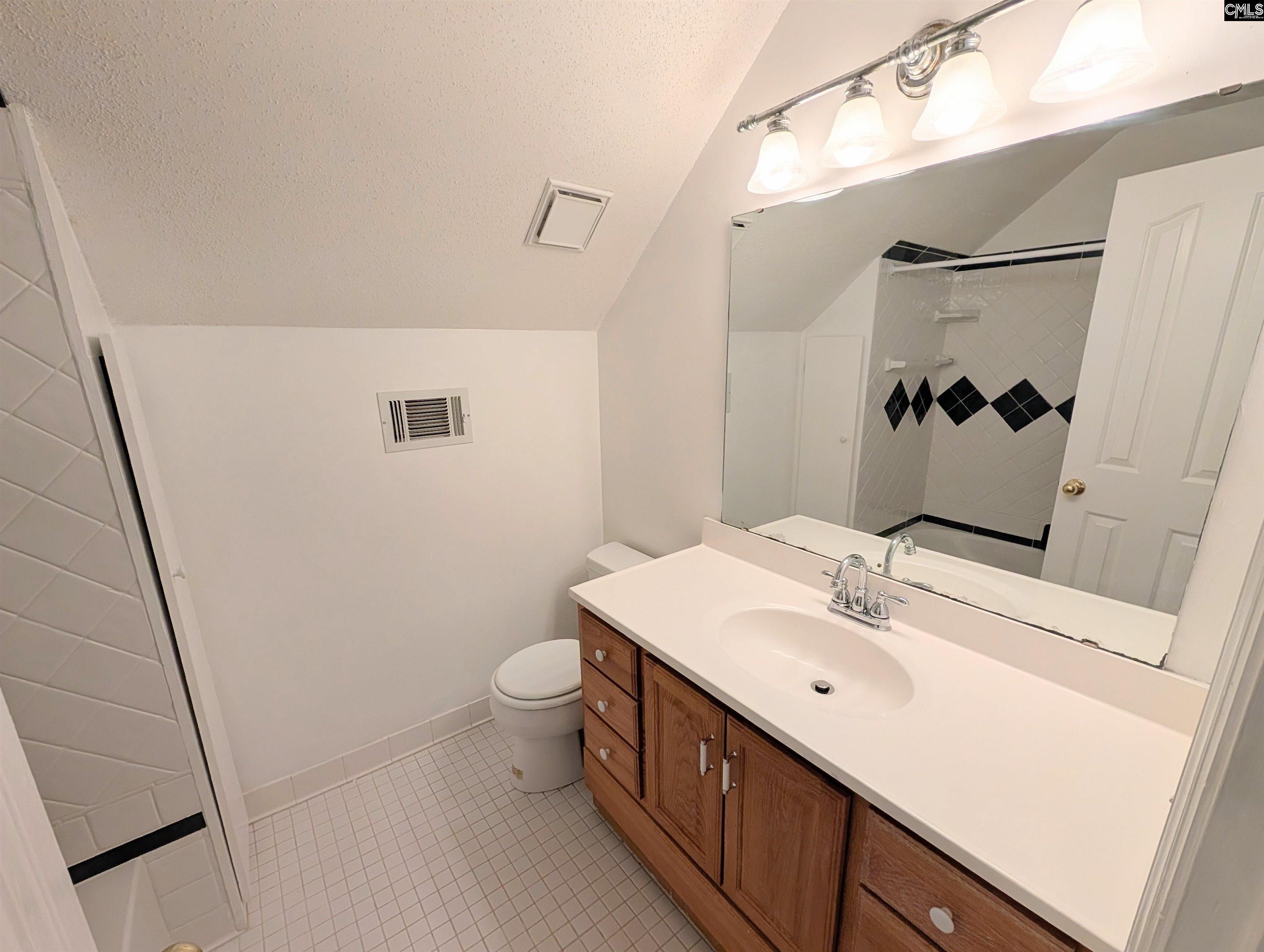 100 Welsh Court Lexington, SC 29073 - Photo 23 of 27 a bathroom with 2 sink and a mirror