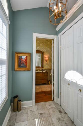 2901 Club Place Gainesville, GA 30506 - Photo 20 of 57 a view of a hallway with a chandelier fan and living room