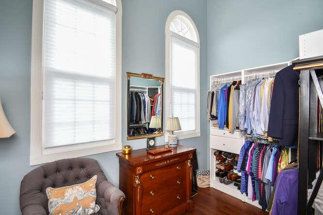2901 Club Place Gainesville, GA 30506 - Photo 28 of 57 a view of walk in closet with clothes and shoes