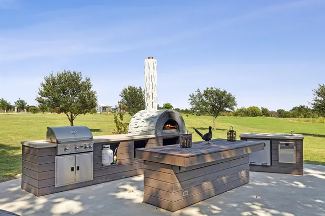 a view of a chairs and table in the terrace
