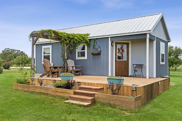 a front view of a house with porch