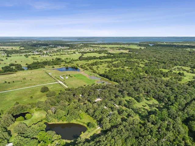 a view of an ocean and a city