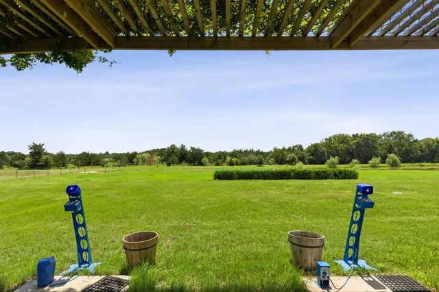 a view of a golf course with a lake
