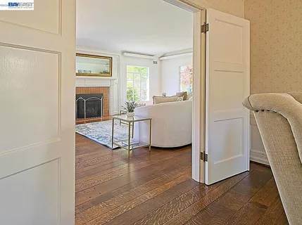 a kitchen with stainless steel appliances a refrigerator and a window