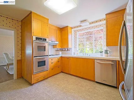 a kitchen with a sink cabinets and counter space