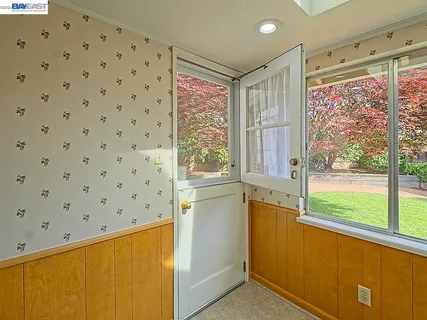 a bedroom with a bed and a cabinets