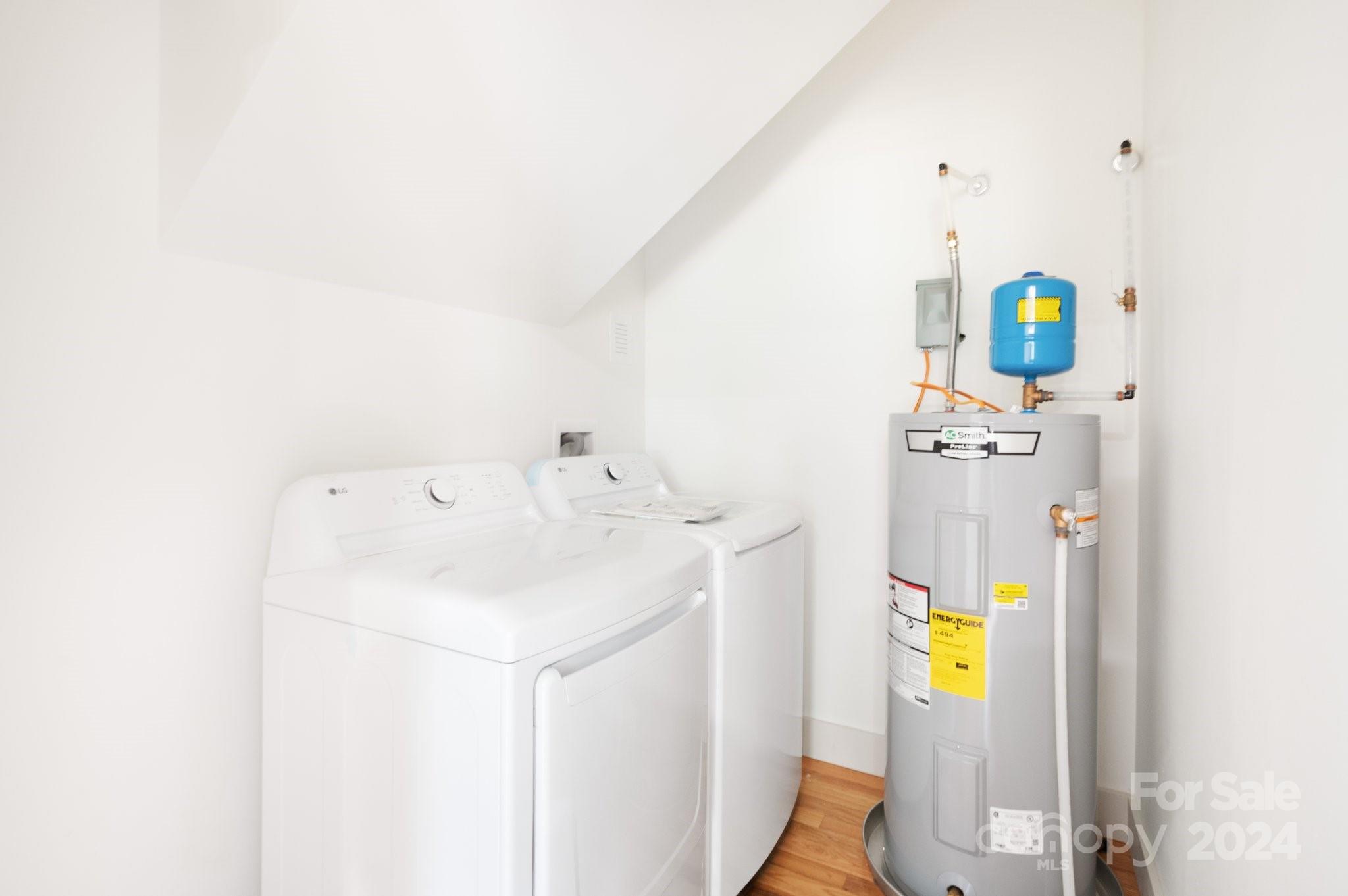 30 Spaulding Road Candler, NC 28715 - Photo 17 of 44 a utility room with dryer and washer