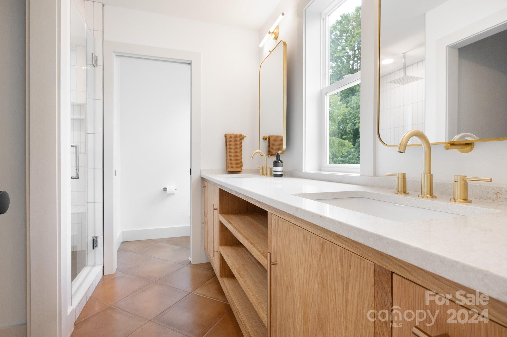 30 Spaulding Road Candler, NC 28715 - Photo 21 of 44 a bathroom with a sink and a mirror