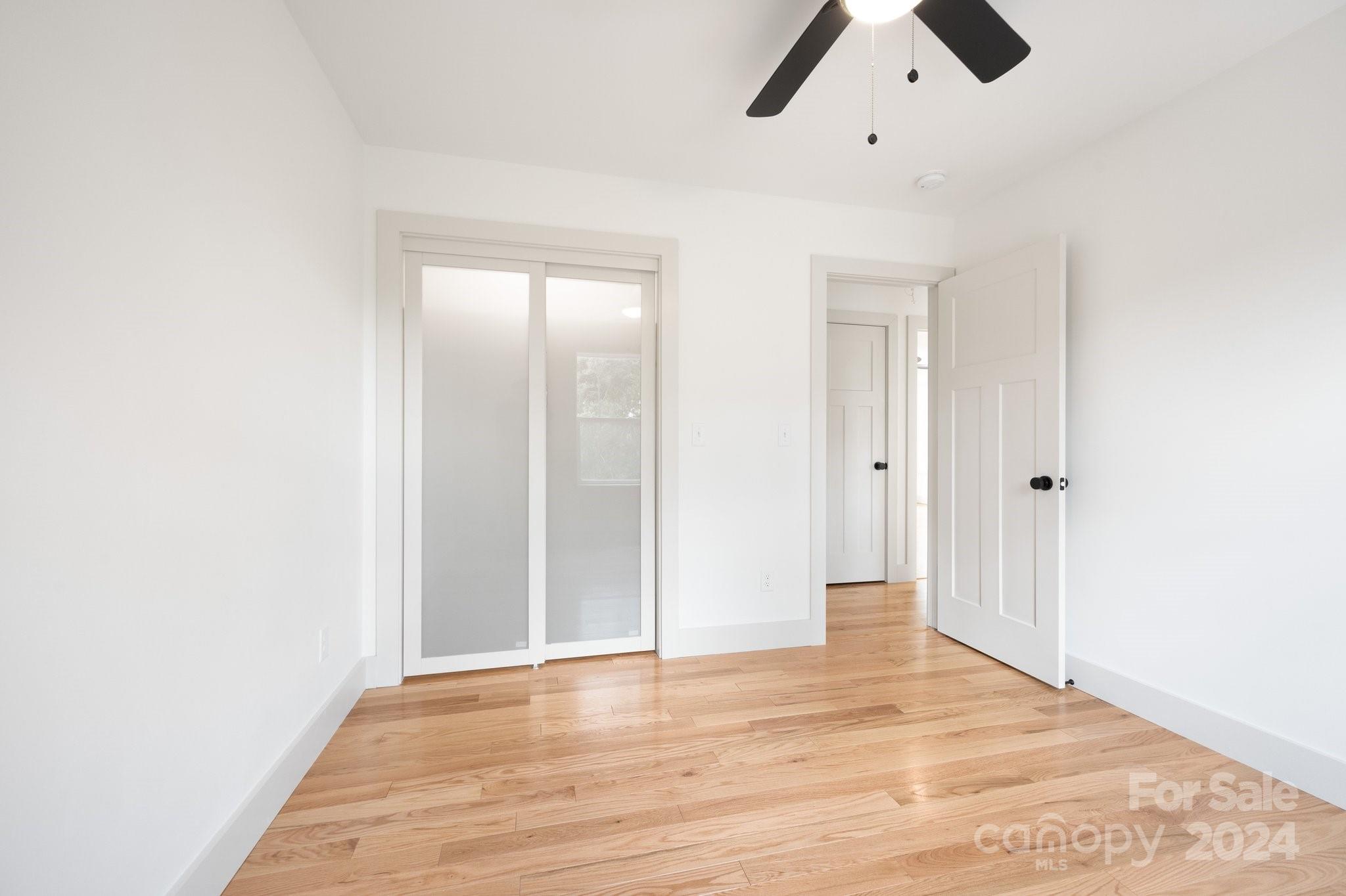 30 Spaulding Road Candler, NC 28715 - Photo 26 of 44 wooden floor in an empty room