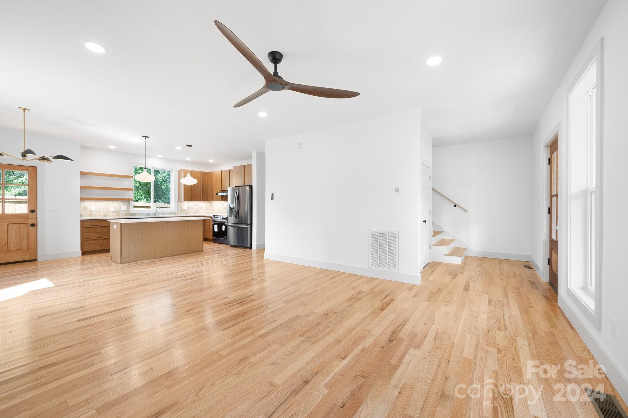 30 Spaulding Road Candler, NC 28715 - Photo 4 of 44 a view of a kitchen with a sink and a stove top oven