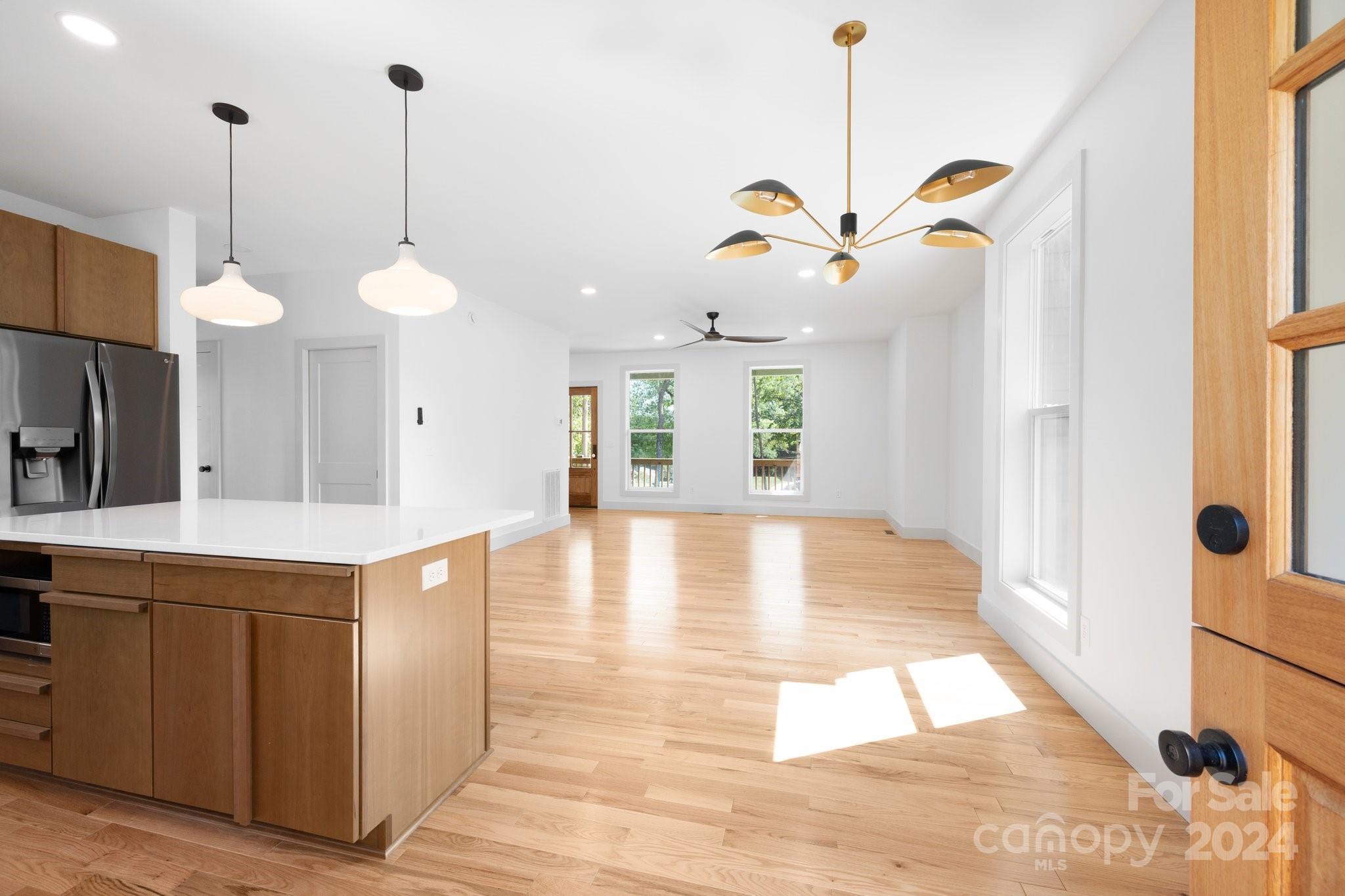 30 Spaulding Road Candler, NC 28715 - Photo 10 of 44 a view of an empty room and window with a chandelier