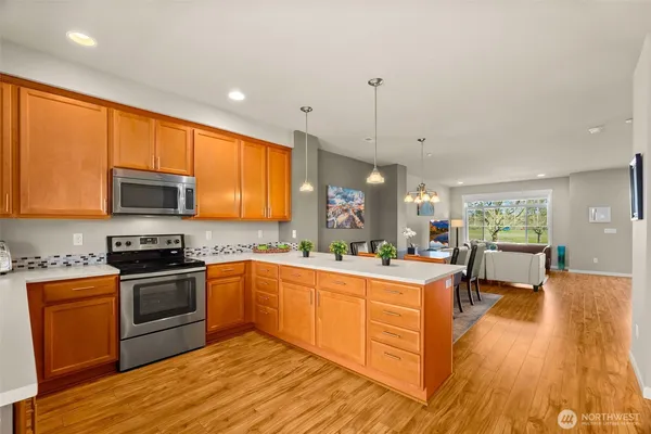 a view of a chairs on wooden deck
