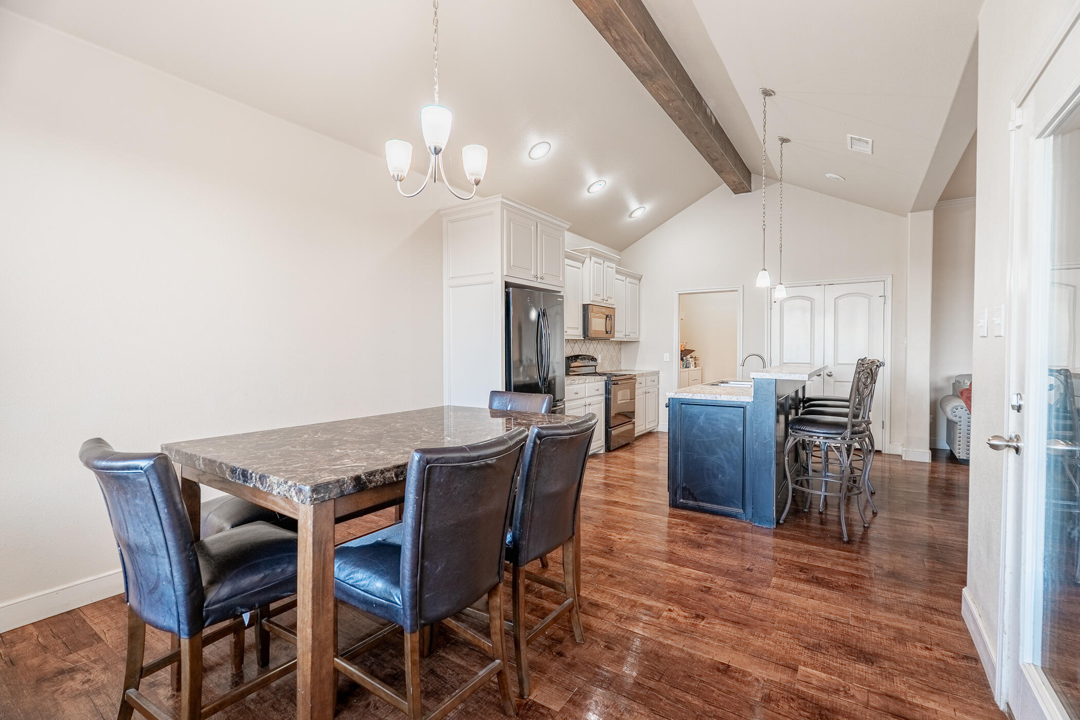 1620 Farm To Market 41 Lubbock, TX 79423 - Photo 20 of 37 a view of a dining room with furniture and chandelier