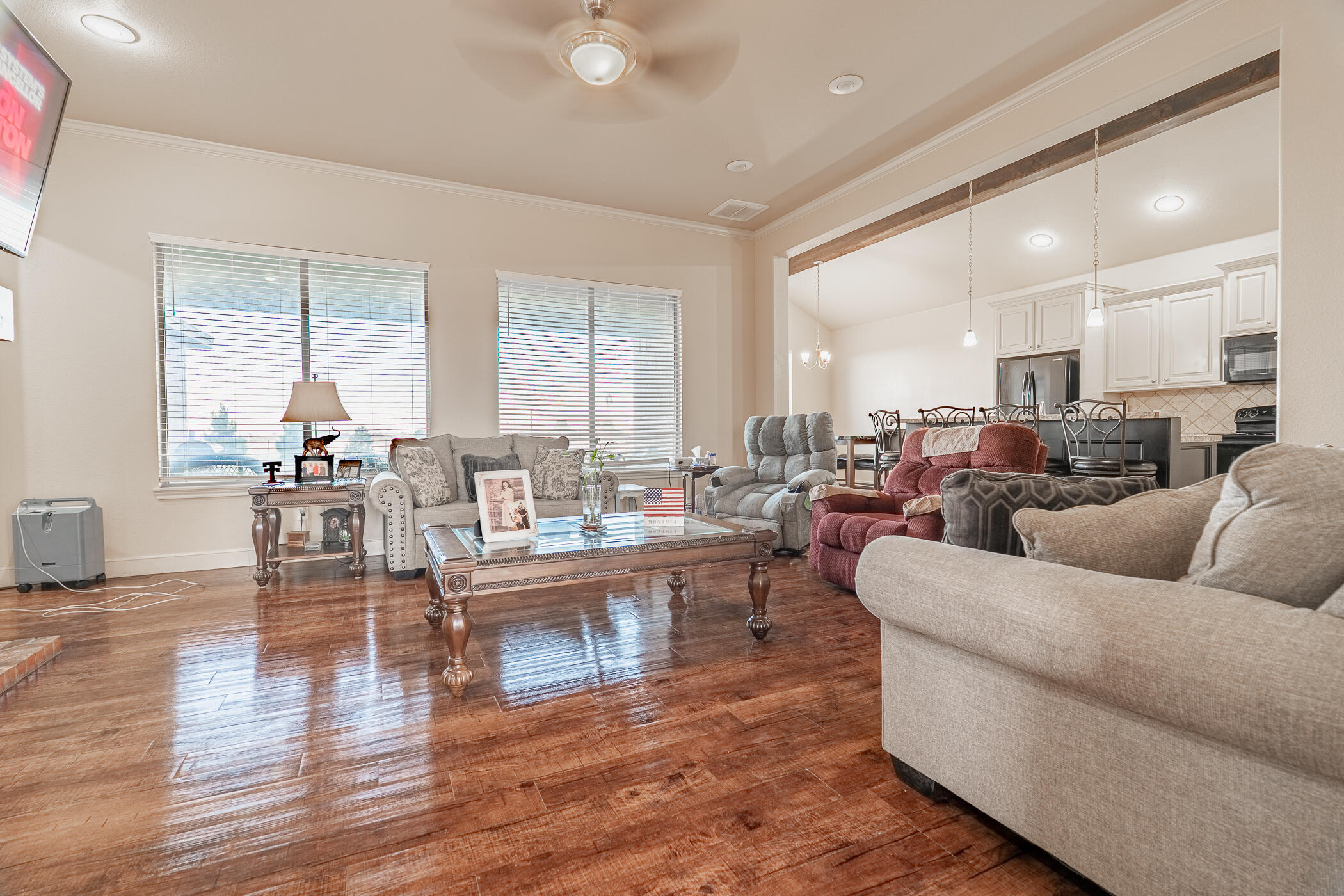1620 Farm To Market 41 Lubbock, TX 79423 - Photo 10 of 37 a living room with furniture wooden floor and a large window