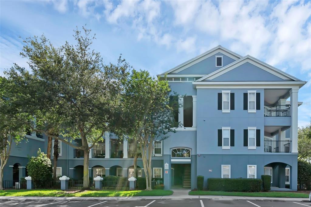 3561 Conroy Road, Unit 216 Orlando, FL 32839 - Photo 1 of 32 a front view of a residential houses with yard
