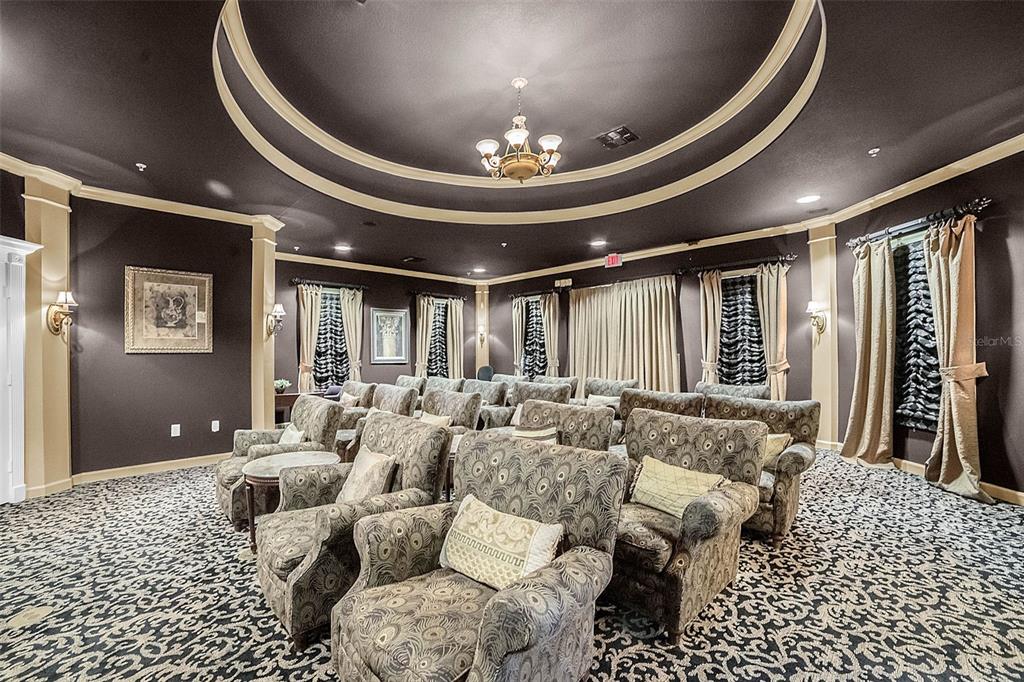 3561 Conroy Road, Unit 216 Orlando, FL 32839 - Photo 23 of 32 a living room with furniture and a chandelier