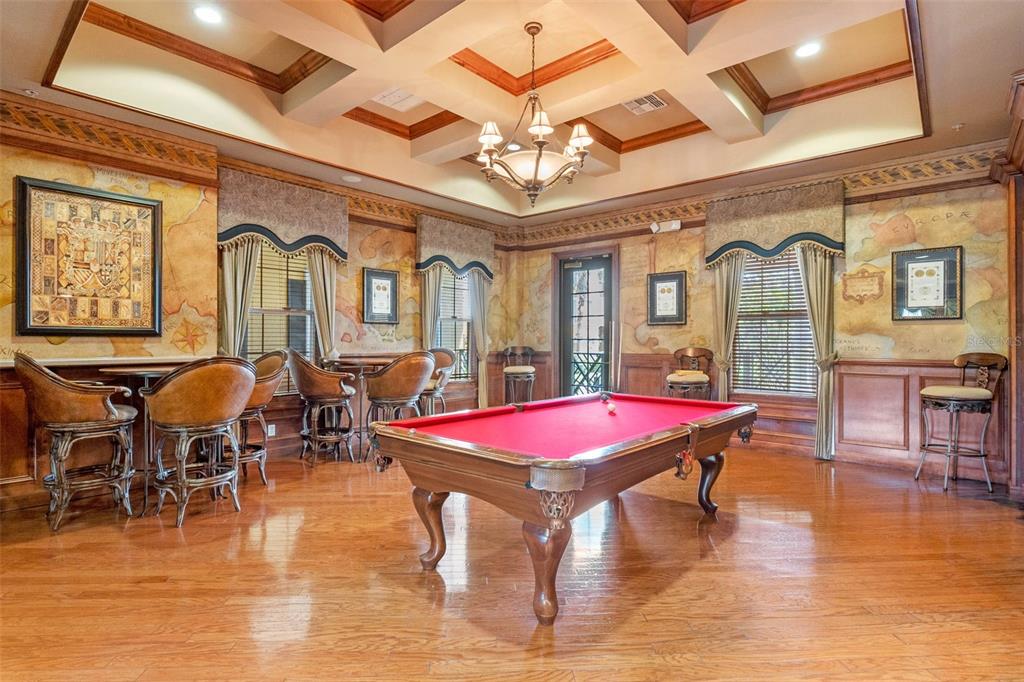 3561 Conroy Road, Unit 216 Orlando, FL 32839 - Photo 26 of 32 a dinning area with pool table and wooden floor