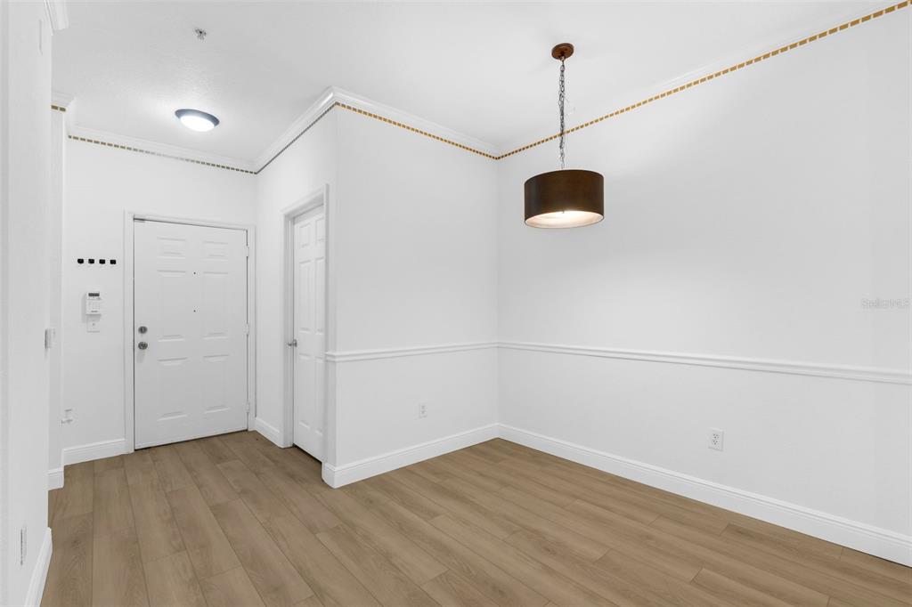 3561 Conroy Road, Unit 216 Orlando, FL 32839 - Photo 8 of 32 a view of a room with wooden floor and a window