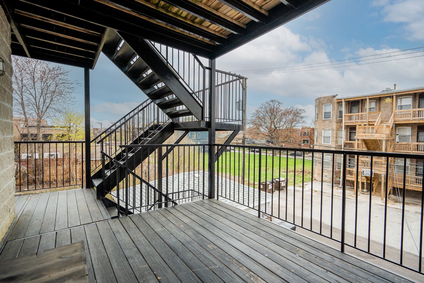 6543 South Ingleside Avenue, Unit 2 Chicago, IL 60637 - Photo 14 of 15 a view of balcony with wooden floor
