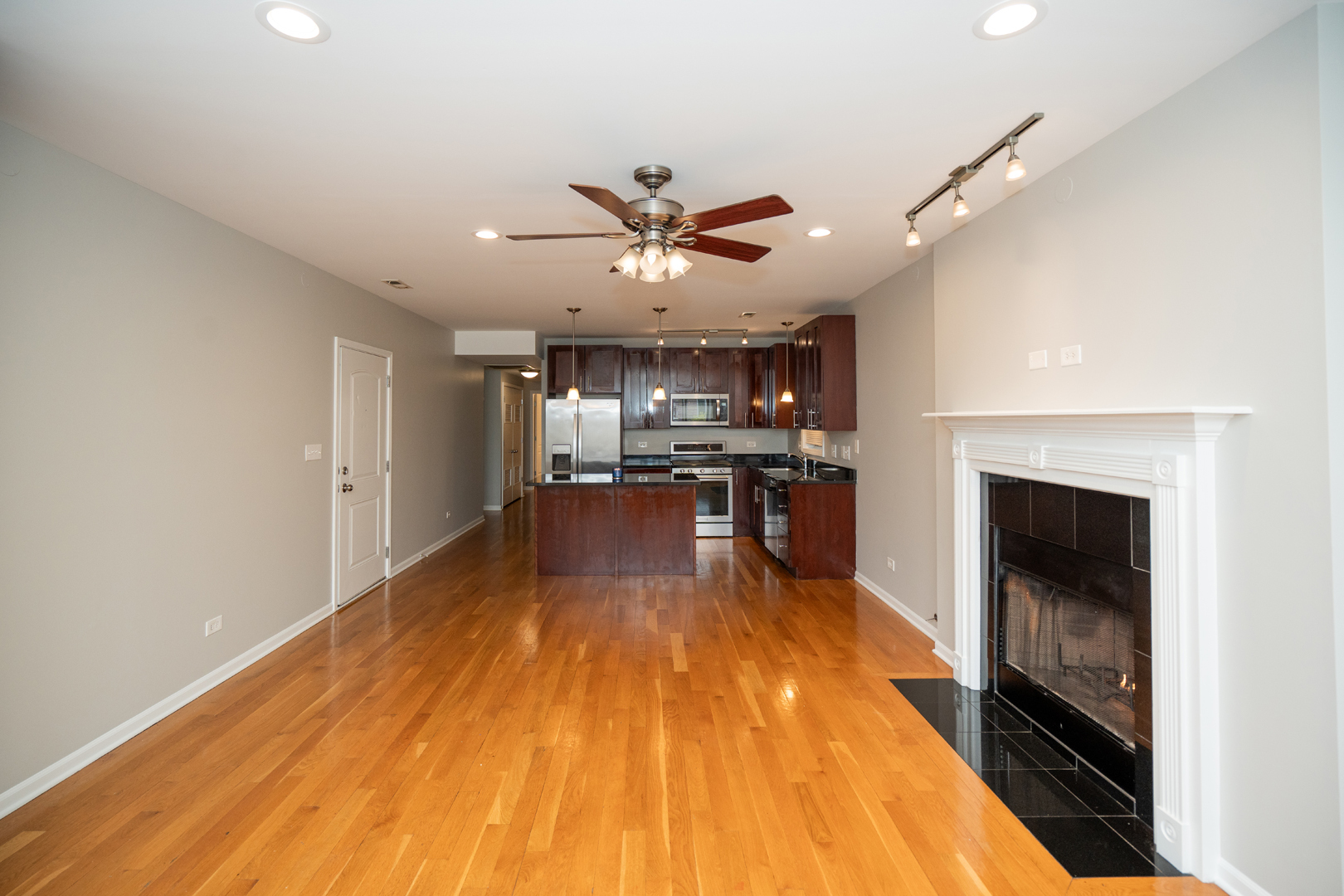 6543 South Ingleside Avenue, Unit 2 Chicago, IL 60637 - Photo 3 of 15 a view of a kitchen with a sink and a stove top oven