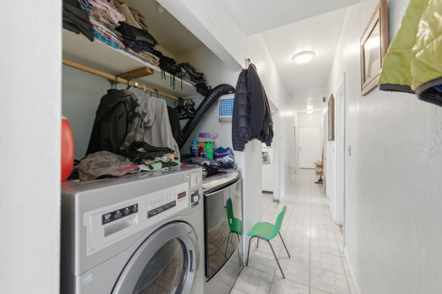 361 North 10th Street San Jose, CA 95112 - Photo 6 of 14 a view of walk in closet with clothes and shoes