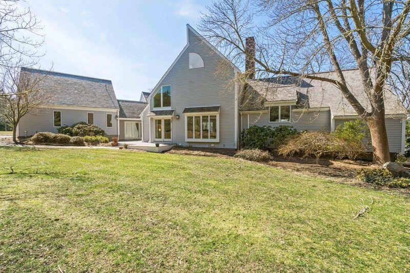 73 Barley Neck Road Orleans, MA 02653 - Photo 13 of 35 a front view of a house with a yard