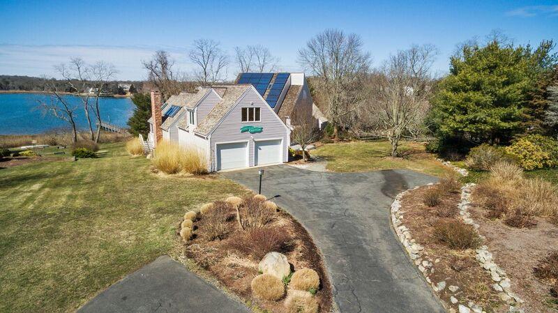 73 Barley Neck Road Orleans, MA 02653 - Photo 34 of 35 a view of a house with a yard