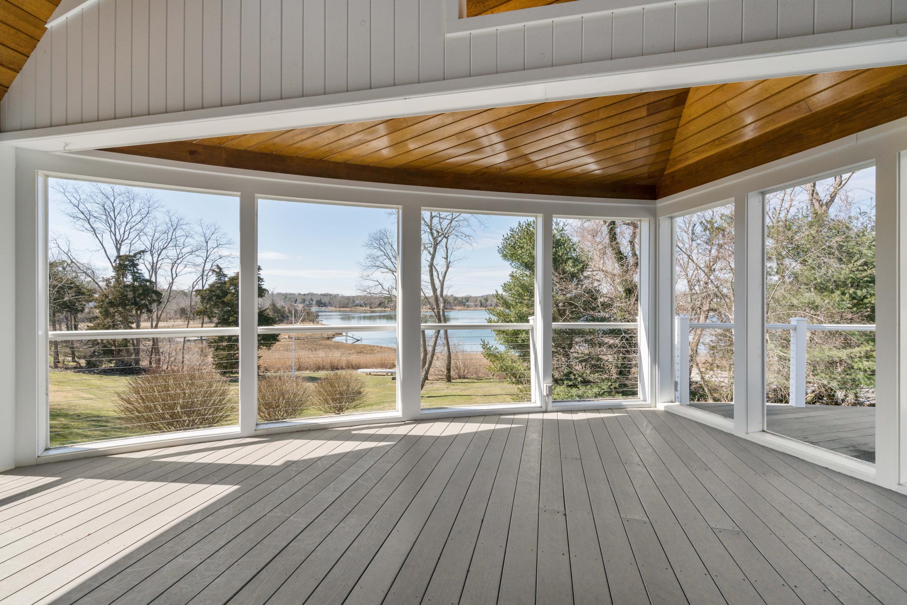 73 Barley Neck Road Orleans, MA 02653 - Photo 6 of 35 a view of wooden floor with a room