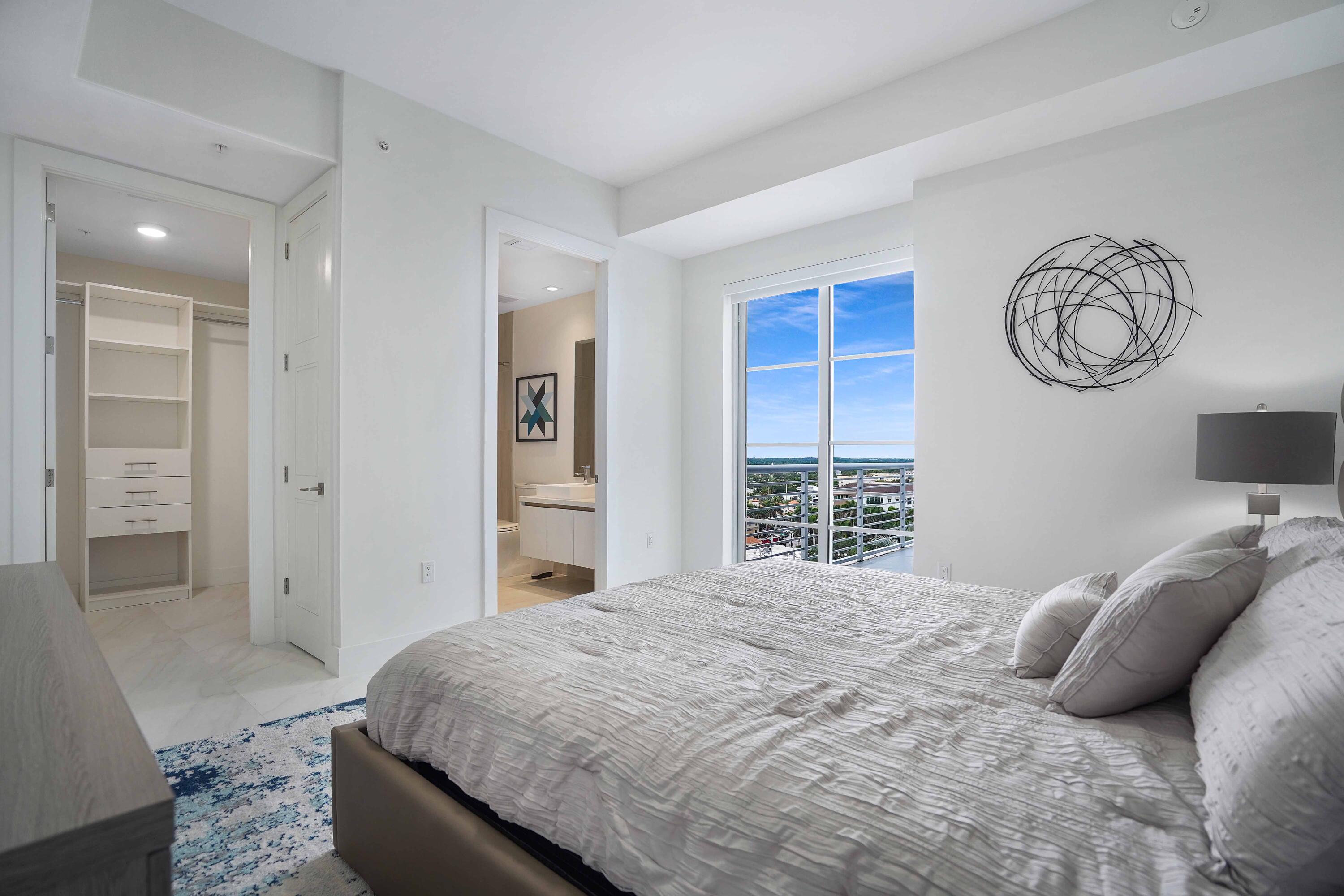 155 East Boca Raton Road, Unit 1116 Boca Raton, FL 33432 - Photo 48 of 80 a bedroom with a bed and a window