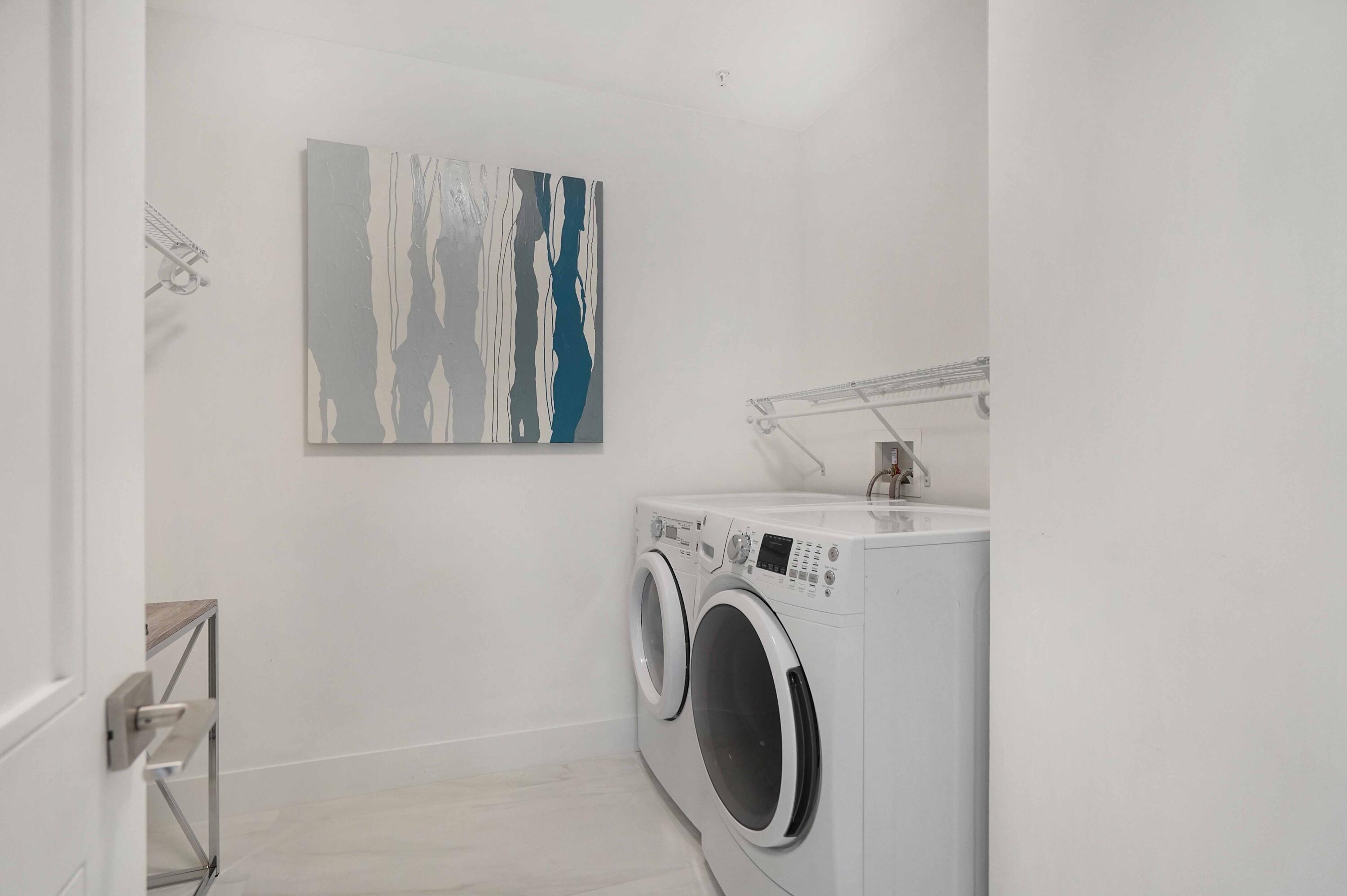 155 East Boca Raton Road, Unit 1116 Boca Raton, FL 33432 - Photo 49 of 80 a utility room with dryer and washer