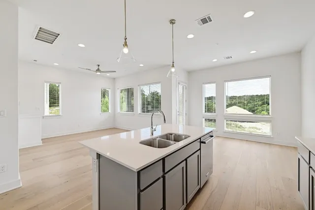 an empty room with fan