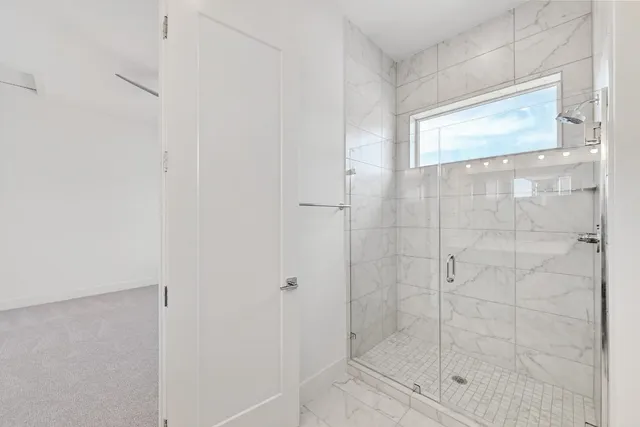 a view of an empty walk in closet