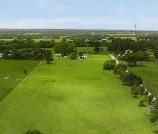 10151 Pless Road Cat Spring, TX 78933 - Photo 2 of 6 a view of a green field with lots of green space
