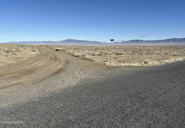 a view of mountain with sunset