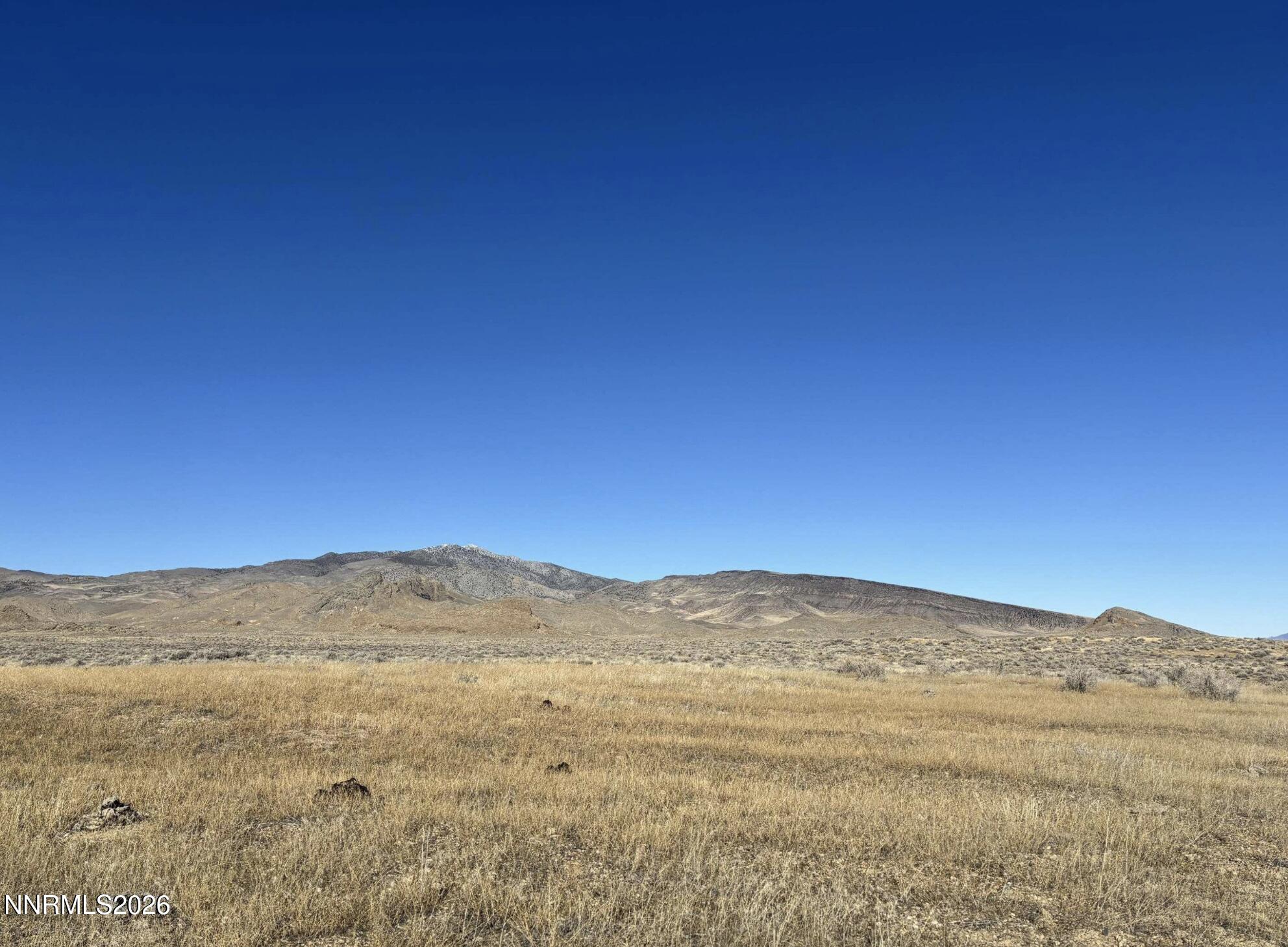 101213 Fencemaker Road Lovelock, NV 89419 - Photo 13 of 17 a view of mountain with sunset
