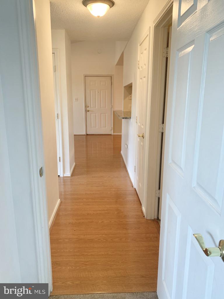 21024 Timber Ridge Terrace, Unit 302 Ashburn, VA 20147 - Photo 11 of 26 Hallway view