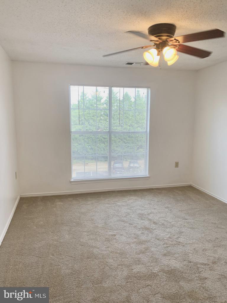 21024 Timber Ridge Terrace, Unit 302 Ashburn, VA 20147 - Photo 12 of 26 Primary with en-suite , WIC & built-in shelves