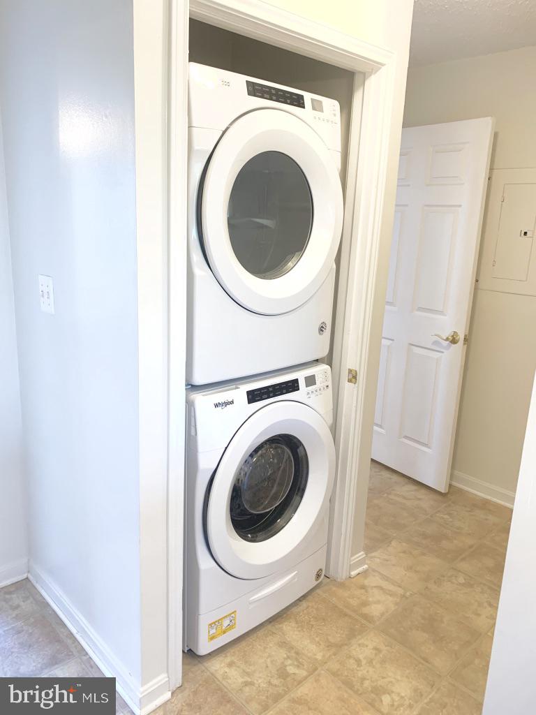 21024 Timber Ridge Terrace, Unit 302 Ashburn, VA 20147 - Photo 16 of 26 Newer full-sized washer/dryer (2020)