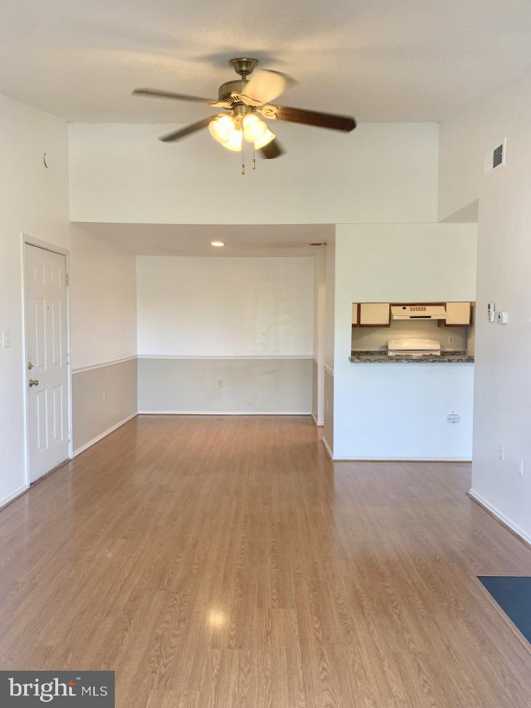 21024 Timber Ridge Terrace, Unit 302 Ashburn, VA 20147 - Photo 4 of 26 open dining area & family room