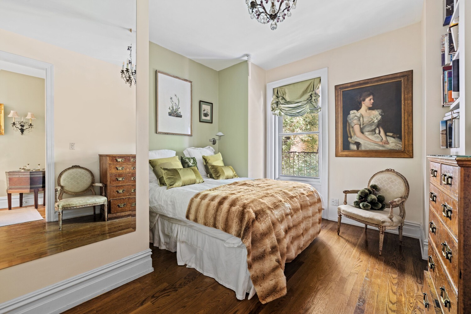 27 East 95th Street, Unit 3E Manhattan, NY 10128 - Photo 5 of 15 a bedroom with a bed and wooden floor