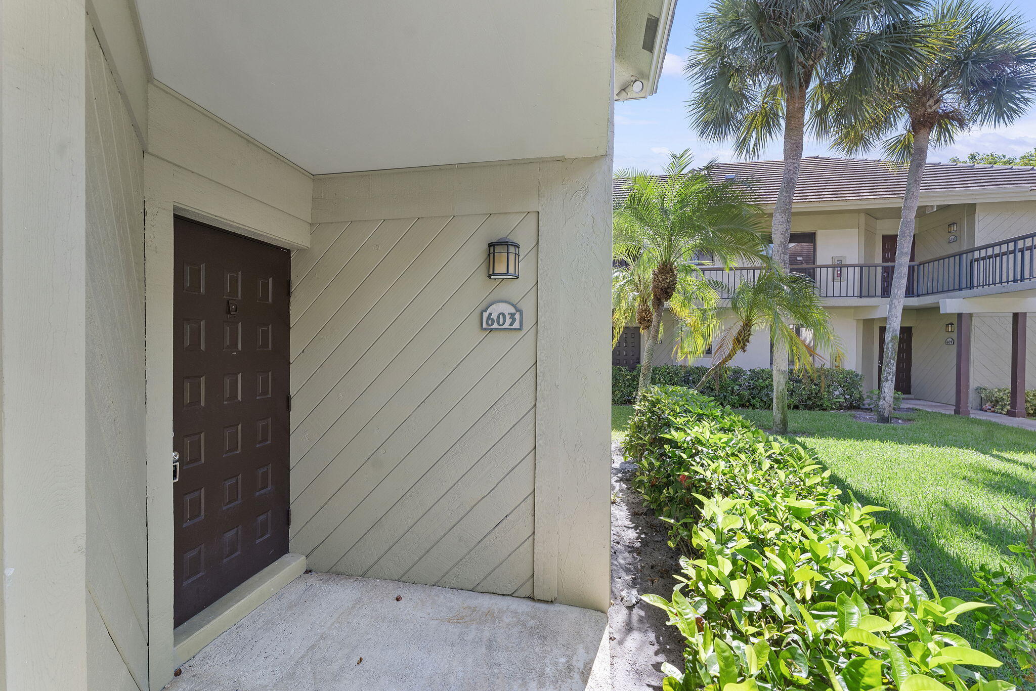 159 Northwest 70th Street, Unit 603 Boca Raton, FL 33487 - Photo 3 of 35 front view of a house