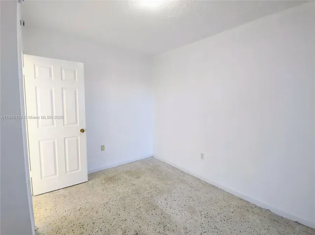a view of a room with an empty room